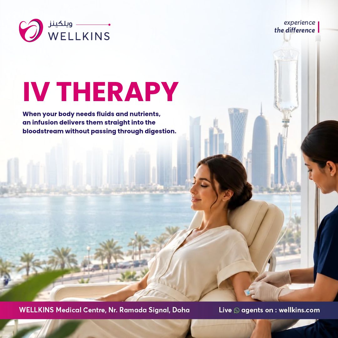 IV therapy and IV drip at Wellkins Medical Centre in Doha, Qatar. A nurse inserting a cannula while a patient receives an infusion.